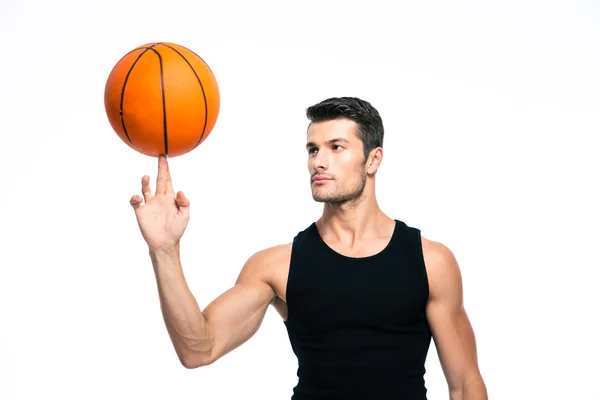 Jogador de basquete bola girando em seu dedo — Fotografia de Stock