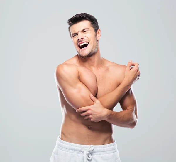 Retrato de un hombre con dolor de codo —  Fotos de Stock