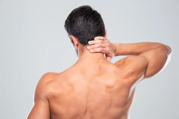 Back view portrait of a man with neck pain — Φωτογραφία Αρχείου