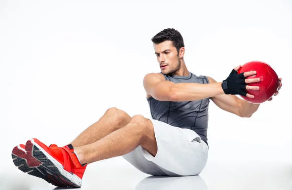 Fitness man working out with fitness ball — Stock Photo, Image