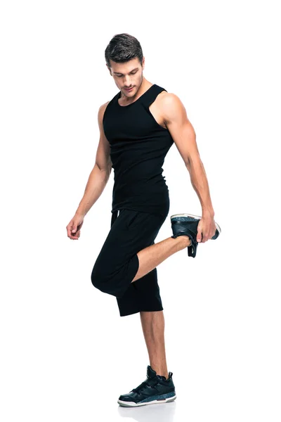 Sport uomo stretching gambe — Foto Stock