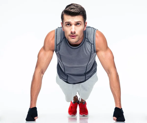 Fitness young man doing push ups — Stock Photo, Image