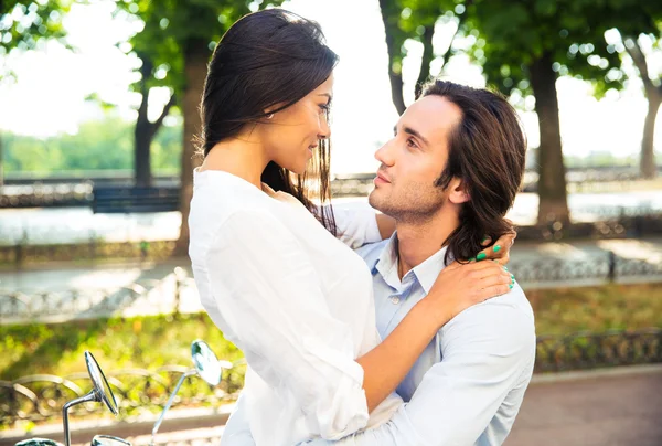 Happy young couple hugging — Stock Photo, Image