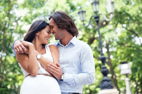 Happy beautiful couple having fun outdoors — Stok fotoğraf