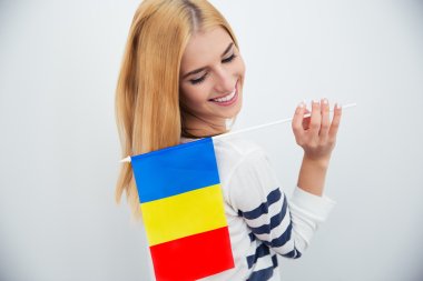 Woman holding Romanian fla