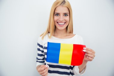 Young girl holding Romanian flag