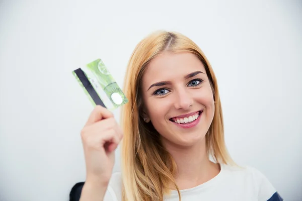 Young girl holding bank card — Stock Fotó