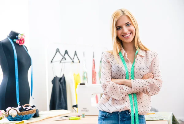 Female tailor with arms folded — Stock Fotó