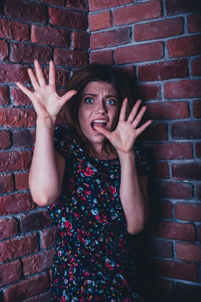 Portrait of a frightened young woman — Stock Photo, Image