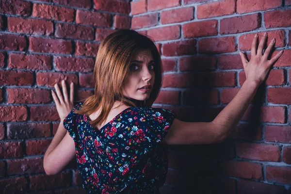 Portrait of a scared young woman — Stock Photo, Image