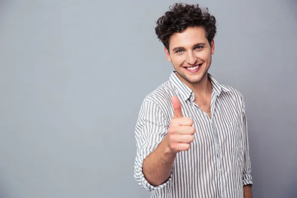 Mutlu bir adam thumb gösterilen — Stok fotoğraf