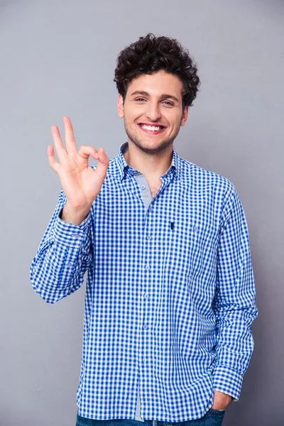 Young man showing ok sign — Stock Photo, Image