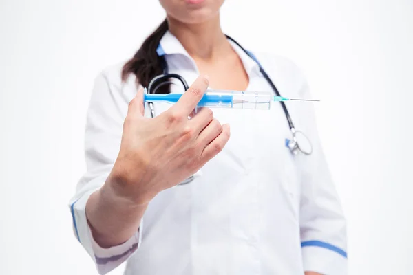 Woman holding syringe — Stock Photo, Image