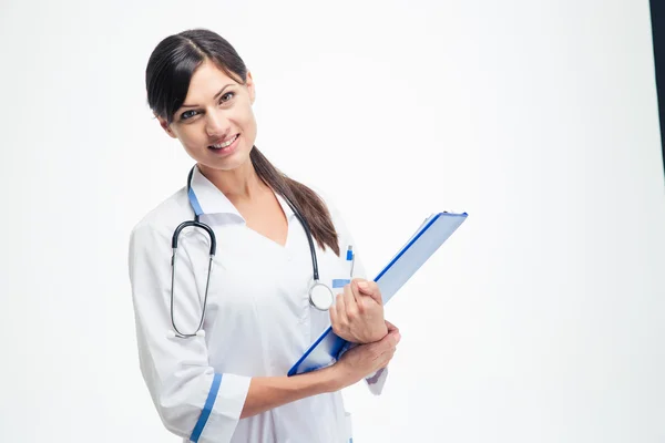 Medical doctor holding clipboard — Stock Photo, Image