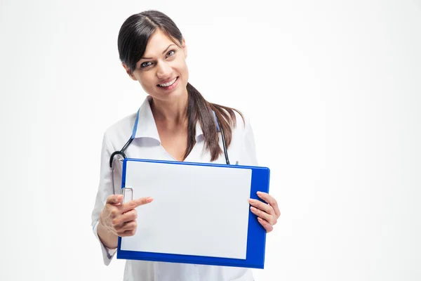 Female doctor pointing finger on clipboard — Stock Photo, Image