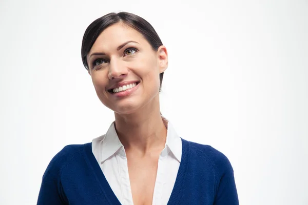 Glimlachende zakenvrouw op zoek omhoog — Stockfoto