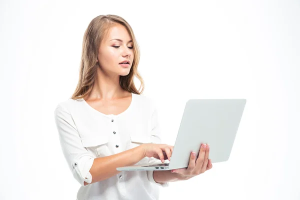 Pretty young woman using laptop — Stock Photo, Image