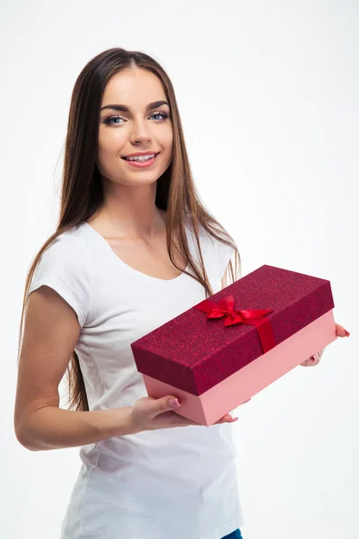 Charming woman holding gift box — Stock Photo, Image