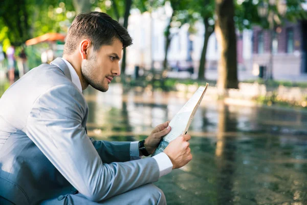 Businessman reading newspaper — Stock Photo, Image