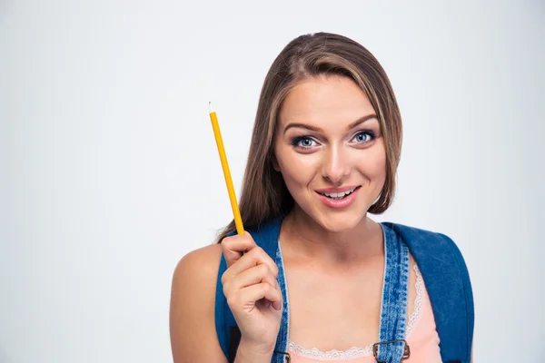 Ritratto di un giovane studente sorridente che tiene la matita — Foto Stock