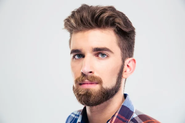 Serious young man looking at camera — Stock Photo, Image