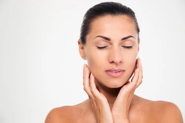 Woman with closed eyes touching her face — Stock Photo, Image