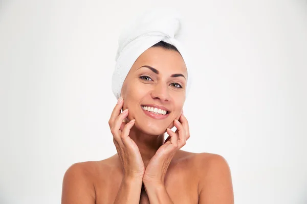 Portrait of a smiling woman with towel on head — Stock Photo, Image