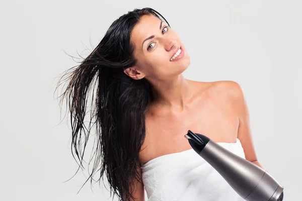 Cheerful woman in towel drying her hair — Stock Photo, Image