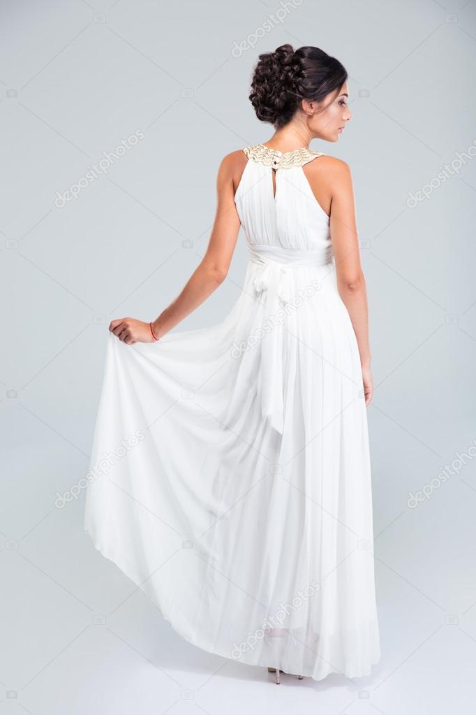 Woman standing in fashion dress 