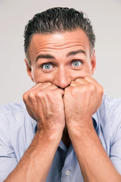 Portrait of a frightened man looking at camera — Stock Photo, Image