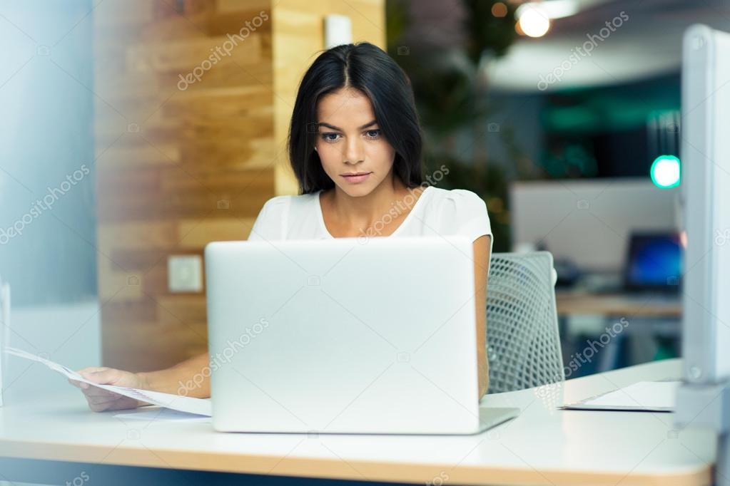 Businesswoman working in office 