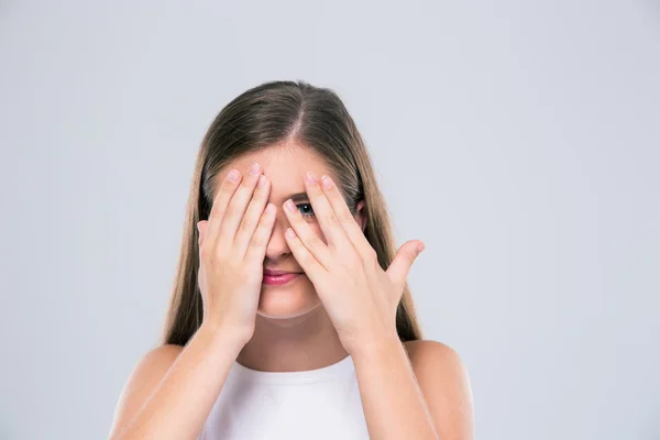 Female teenager covering her eyes — Stock Photo, Image