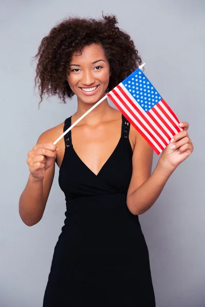 Afro americký žena drží vlajky Usa — Stock fotografie