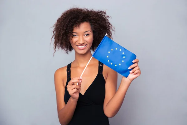 Afro american woman holding Euro flag — Stock Photo, Image