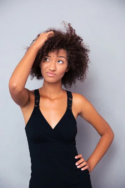 Pensive afro american woman looking up — Stock Photo, Image