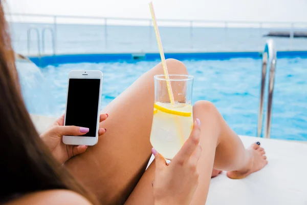 Portrait of a girl lying on deckchair — Stock Photo, Image