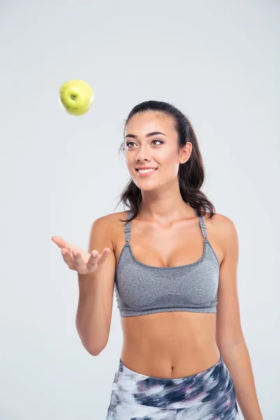 Portrait of a happy attractive woman with apple — Stock Photo, Image