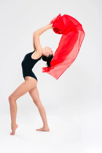 Chica joven en traje de gimnasta — Foto de Stock