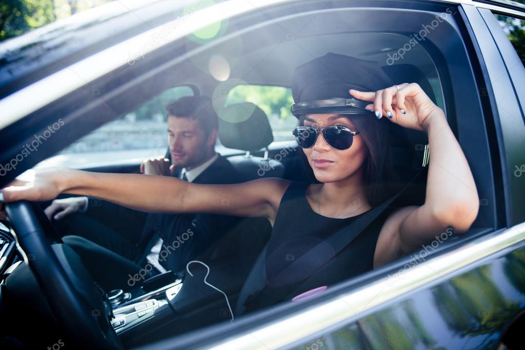 Stylish woman in sunglasses driving car Stock Photo by ©Vadymvdrobot  81903362