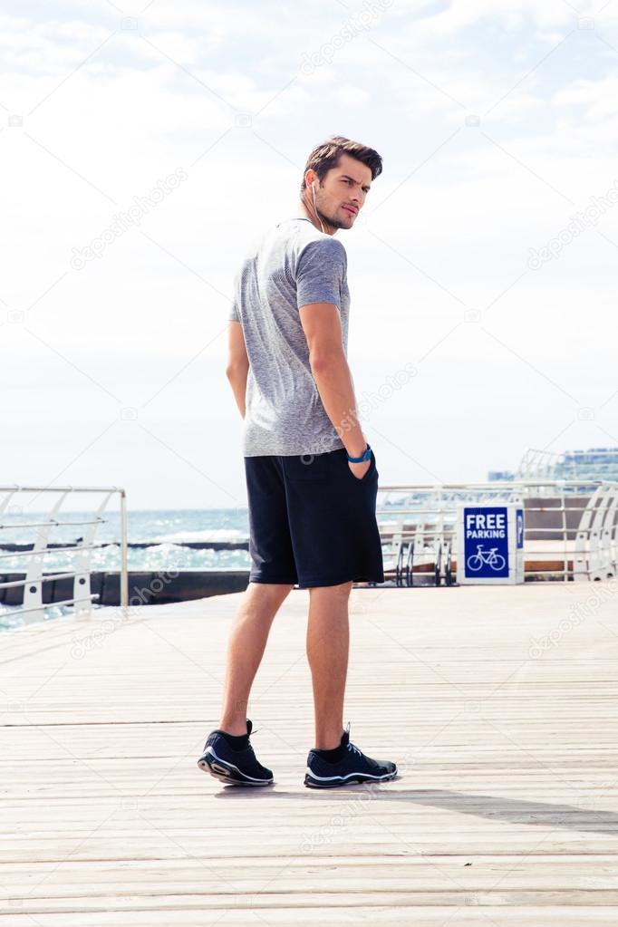 Man in sports wear walking outdoors