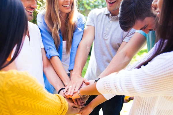 Students hands together — Stock Photo, Image