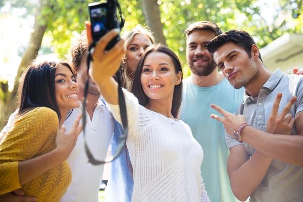 Friends making selfie photo on camera — Stock Photo, Image