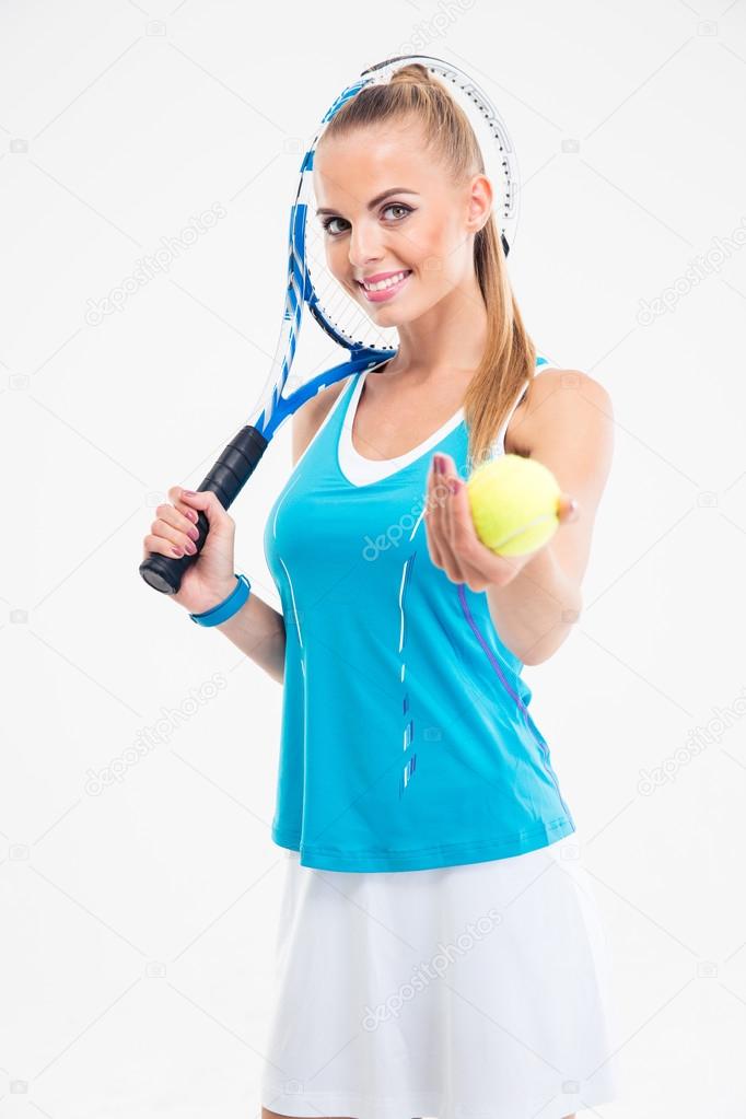 Smiling woman holding tennis player and ball