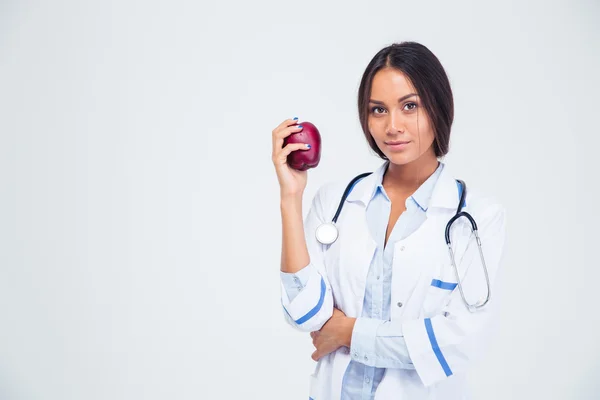 Elma tutan güzel kadın doktor portresi — Stok fotoğraf