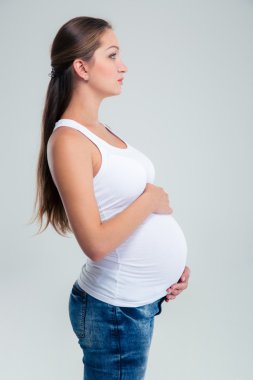 Side view portrait of a pregnant