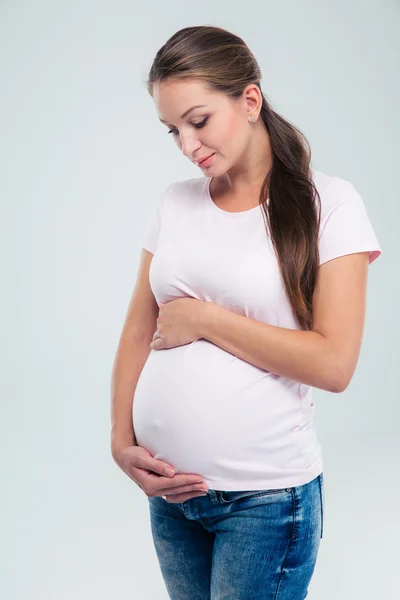 Terhes nő simogatja a hasát — Stock Fotó