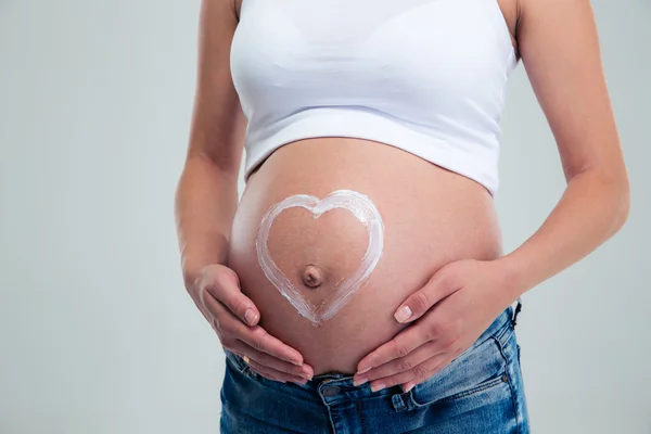 Mujer embarazada con forma de corazón — Foto de Stock