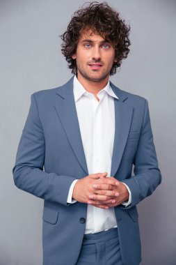 Portrait of a happy businessman looking at camera
