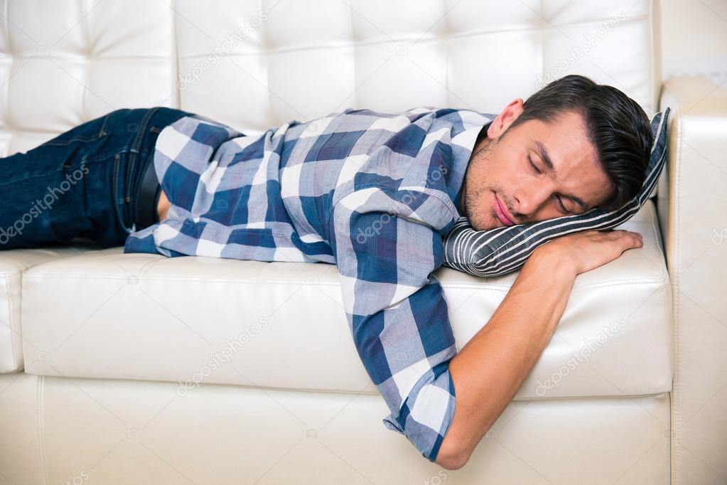 Man resting on the sofa at home