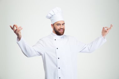 Happy chef cook showing welcome gesture clipart